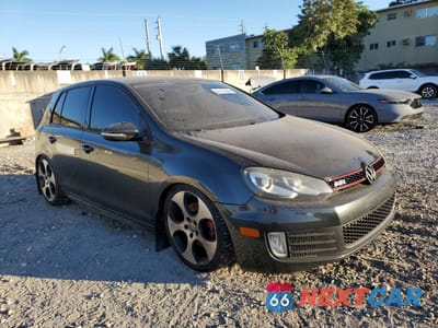Czwarte zdjęcie samochodu z boku: 2011 VOLKSWAGEN GTI VIN:WVWGV7AJ2BW261887 - miniatura