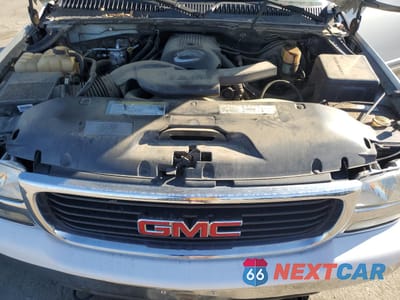 Zdjęcie 11 z 12 samochodu: 2001 GMC YUKON VIN:1GKEC13T81J250465 - miniatura