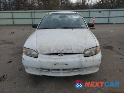 Piąte zdjęcie samochodu w środku: 1999 HYUNDAI ACCENT GL VIN:KMHVF24N6XU566295 - miniatura