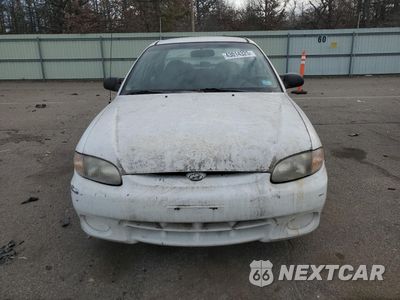 Piąte zdjęcie samochodu w środku: 1999 HYUNDAI ACCENT GL VIN:KMHVF24N6XU566295 - miniatura