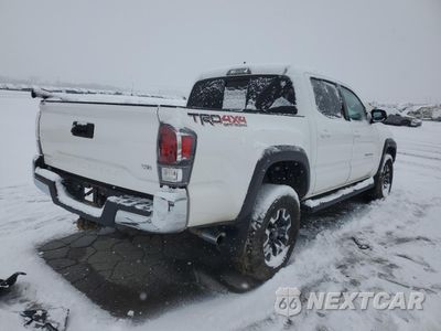 Trzecie zdjęcie samochodu z tyłu: 2020 TOYOTA TACOMA DOUBLE CAB VIN:5TFCZ5AN8LX222498 - miniatura