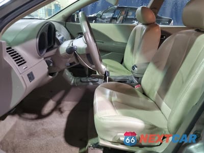 Zdjęcie 7 z 13 samochodu: 2002 NISSAN ALTIMA BASE VIN:1N4AL11E12C701097 - miniatura