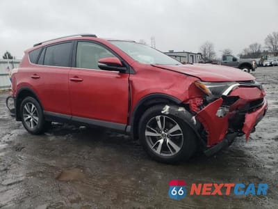 Czwarte zdjęcie samochodu z boku: 2017 TOYOTA RAV4 XLE VIN:JTMRFREVXHJ129268 - miniatura