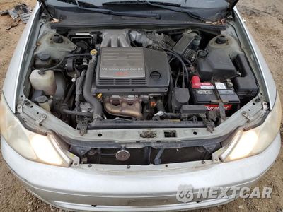 Zdjęcie 12 z 14 samochodu: 2000 TOYOTA AVALON XL VIN:4T1BF28B8YU021333 - miniatura