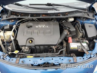 Zdjęcie 12 z 14 samochodu: 2010 TOYOTA COROLLA BASE VIN:2T1BU4EE8AC528031 - miniatura