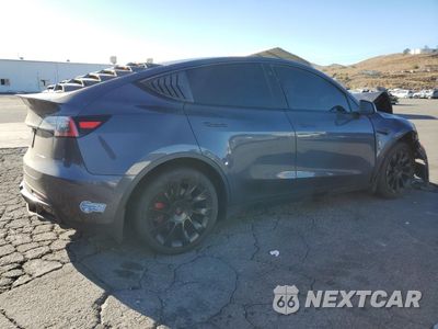 Trzecie zdjęcie samochodu z tyłu: 2021 TESLA MODEL Y VIN:5YJYGDEE8MF099040 - miniatura