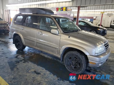 Czwarte zdjęcie samochodu z boku: 2002 SUZUKI XL7 PLUS VIN:JS3TX92V424103909 - miniatura