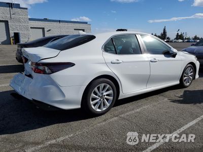 Trzecie zdjęcie samochodu z tyłu: 2023 TOYOTA CAMRY LE VIN:4T1C11AK4PU118082 - miniatura