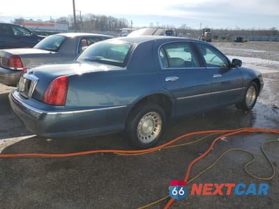 Piąte zdjęcie samochodu w środku: 2001 LINCOLN TOWN CAR EXECUTIVE VIN:1LNHM81W01Y648008 - miniatura