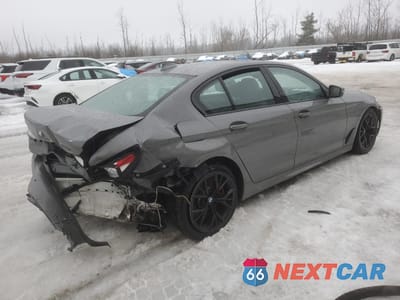 Trzecie zdjęcie samochodu z tyłu: 2021 BMW M550XI VIN:WBA13BK05MCF97316 - miniatura