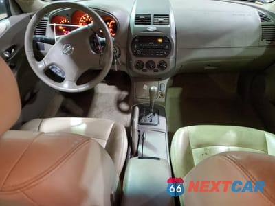 Zdjęcie 8 z 13 samochodu: 2002 NISSAN ALTIMA BASE VIN:1N4AL11E12C701097 - miniatura