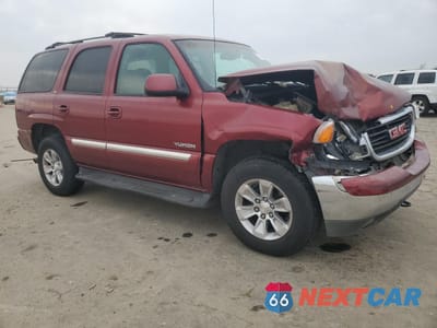 Czwarte zdjęcie samochodu z boku: 2002 GMC YUKON VIN:1GKEC13T02R245117 - miniatura