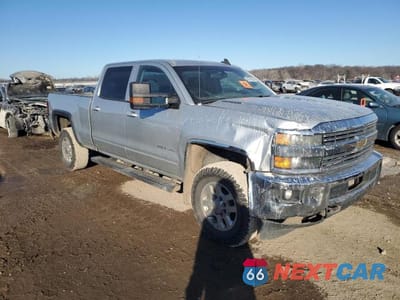 Czwarte zdjęcie samochodu z boku: 2015 CHEVROLET SILVERADO K2500 HEAVY DUTY LT VIN:1GC1KVE89FF569882 - miniatura