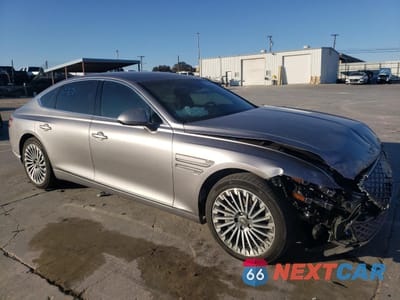 Czwarte zdjęcie samochodu z boku: 2023 GENESIS G80 VIN:KMTGE4S12PU003399 - miniatura