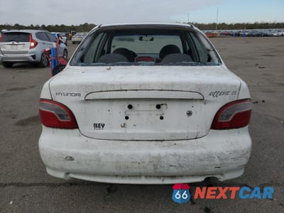 Zdjęcie 6 z 12 samochodu: 1999 HYUNDAI ACCENT GL VIN:KMHVF24N6XU566295 - miniatura