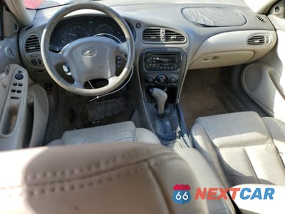 Zdjęcie 8 z 14 samochodu: 2000 OLDSMOBILE ALERO GLS VIN:1G3NF52E0YC317362 - miniatura