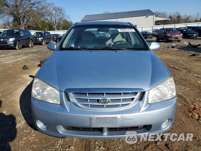 Piąte zdjęcie samochodu w środku: 2005 KIA SPECTRA LX VIN:KNAFE121365236917 - miniatura