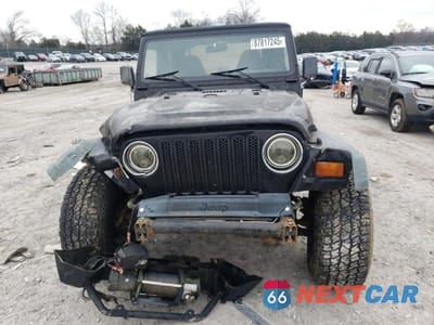 Piąte zdjęcie samochodu w środku: 1999 JEEP WRANGLER / TJ SE VIN:1J4FY29PXXP482454 - miniatura