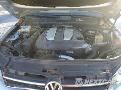Zdjęcie 14 z 15 samochodu: 2012 VOLKSWAGEN TOUAREG V6 TDI VIN:WVGEK9BP2CD012187 - miniatura