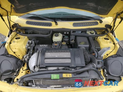 Zdjęcie 12 z 14 samochodu: 2002 MINI COOPER S VIN:WMWRE33412TD54930 - miniatura