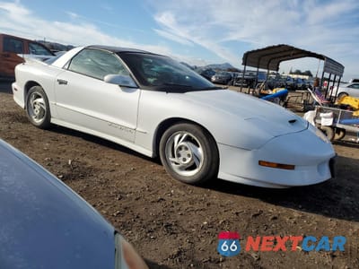 Czwarte zdjęcie samochodu z boku: 1997 PONTIAC FIREBIRD FORMULA VIN:2G2FV22P6V2219153 - miniatura