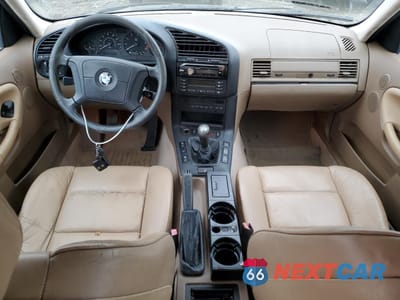 Zdjęcie 8 z 12 samochodu: 1997 BMW 318 I VIN:WBACC932XVEE56409 - miniatura