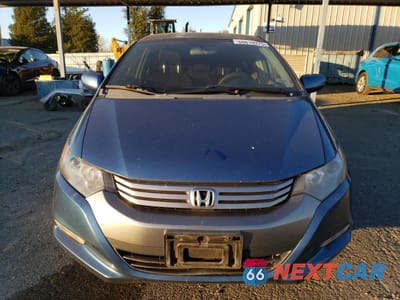Piąte zdjęcie samochodu w środku: 2010 HONDA INSIGHT LX VIN:JHMZE2H51AS030763 - miniatura
