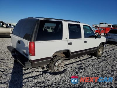 Trzecie zdjęcie samochodu z tyłu: 1996 CHEVROLET TAHOE K1500 VIN:1GNEK13R4TJ316913 - miniatura