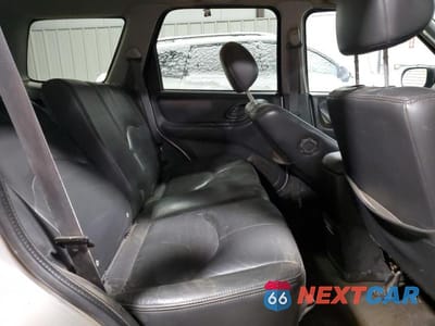 Zdjęcie 11 z 13 samochodu: 2004 MAZDA TRIBUTE VIN:4F2CZ96184KM26214 - miniatura