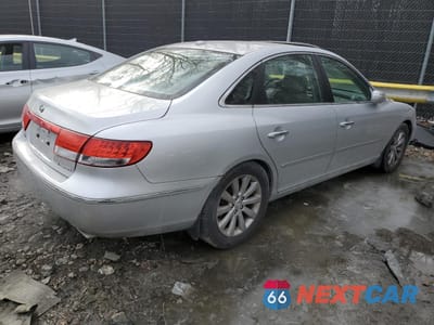 Trzecie zdjęcie samochodu z tyłu: 2009 HYUNDAI AZERA SE VIN:KMHFC46F99A343316 - miniatura