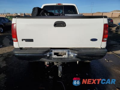 Zdjęcie 6 z 12 samochodu: 2001 FORD F350 SRW SUPER DUTY VIN:1FTSW31F31EA57700 - miniatura