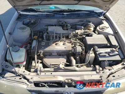 Zdjęcie 11 z 12 samochodu: 1995 TOYOTA COROLLA LE VIN:1NXAE09B2SZ329302 - miniatura
