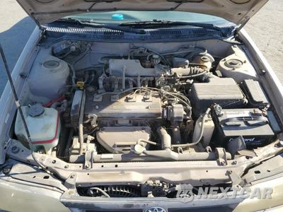 Zdjęcie 11 z 12 samochodu: 1995 TOYOTA COROLLA LE VIN:1NXAE09B2SZ329302 - miniatura