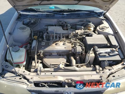 Zdjęcie 11 z 12 samochodu: 1995 TOYOTA COROLLA LE VIN:1NXAE09B2SZ329302 - miniatura