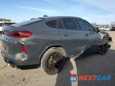 Trzecie zdjęcie samochodu z tyłu: 2022 BMW X6 M VIN:5YMCY0C04N9K70845 - miniatura