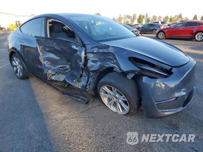 Czwarte zdjęcie samochodu z boku: 2023 TESLA MODEL Y VIN:7SAYGDEE3PA135088 - miniatura