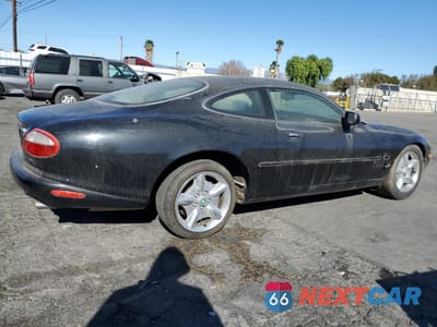 Trzecie zdjęcie samochodu z tyłu: 1997 JAGUAR XK8 VIN:SAJGX5740VC001253 - miniatura