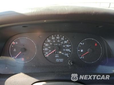 Zdjęcie 9 z 12 samochodu: 1995 TOYOTA COROLLA LE VIN:1NXAE09B2SZ329302 - miniatura