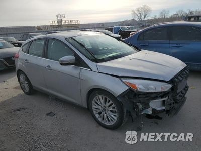Czwarte zdjęcie samochodu z boku: 2017 FORD FOCUS TITANIUM VIN:1FADP3N24HL272883 - miniatura