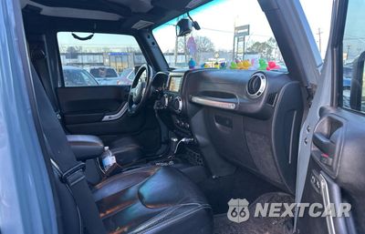Piąte zdjęcie samochodu w środku: 2015 JEEP WRANGLER UNLIMITED RUBICON VIN:1C4BJWFG9FL591711 - miniatura