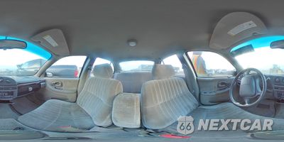 Zdjęcie 13 z 14 samochodu: 2001 CHEVROLET LUMINA VIN:2G1WL52J311192632 - miniatura