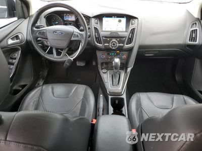 Zdjęcie 8 z 14 samochodu: 2017 FORD FOCUS TITANIUM VIN:1FADP3N28HL214498 - miniatura