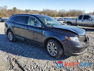 Czwarte zdjęcie samochodu z boku: 2014 LINCOLN MKT VIN:2LMHJ5FK7EBL53525 - miniatura