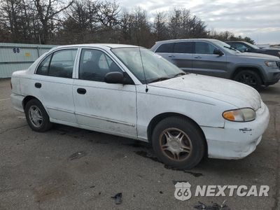 Czwarte zdjęcie samochodu z boku: 1999 HYUNDAI ACCENT GL VIN:KMHVF24N6XU566295 - miniatura
