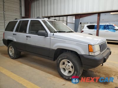 Czwarte zdjęcie samochodu z boku: 1996 JEEP GRAND CHEROKEE LAREDO VIN:1J4GZ58Y2TC203321 - miniatura