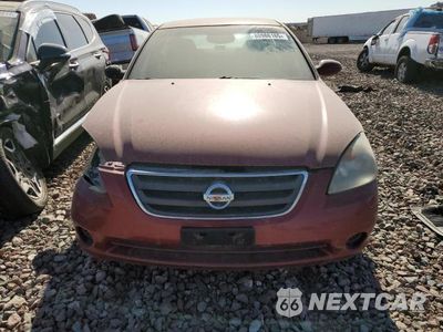 Piąte zdjęcie samochodu w środku: 2004 NISSAN ALTIMA BASE VIN:1N4AL11D14C128826 - miniatura