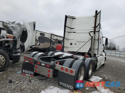 Czwarte zdjęcie samochodu z boku: 2012 VOLVO VN VNL VIN:4V4NC9EJ5CN538790 - miniatura
