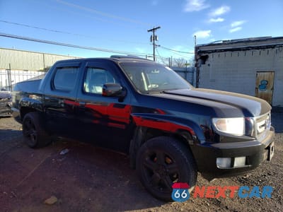 Czwarte zdjęcie samochodu z boku: 2011 HONDA RIDGELINE RTL VIN:5FPYK1F53BB008370 - miniatura
