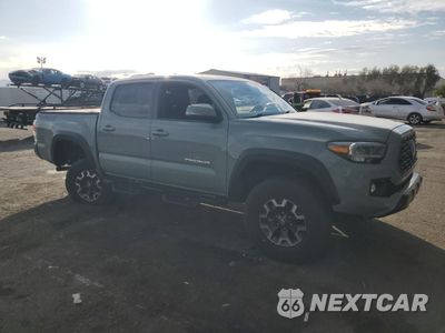 Czwarte zdjęcie samochodu z boku: 2022 TOYOTA TACOMA DOUBLE CAB VIN:3TYCZ5AN3NT096886 - miniatura