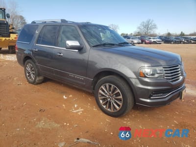 Czwarte zdjęcie samochodu z boku: 2015 LINCOLN NAVIGATOR VIN:5LMJJ2HT0FEJ14371 - miniatura